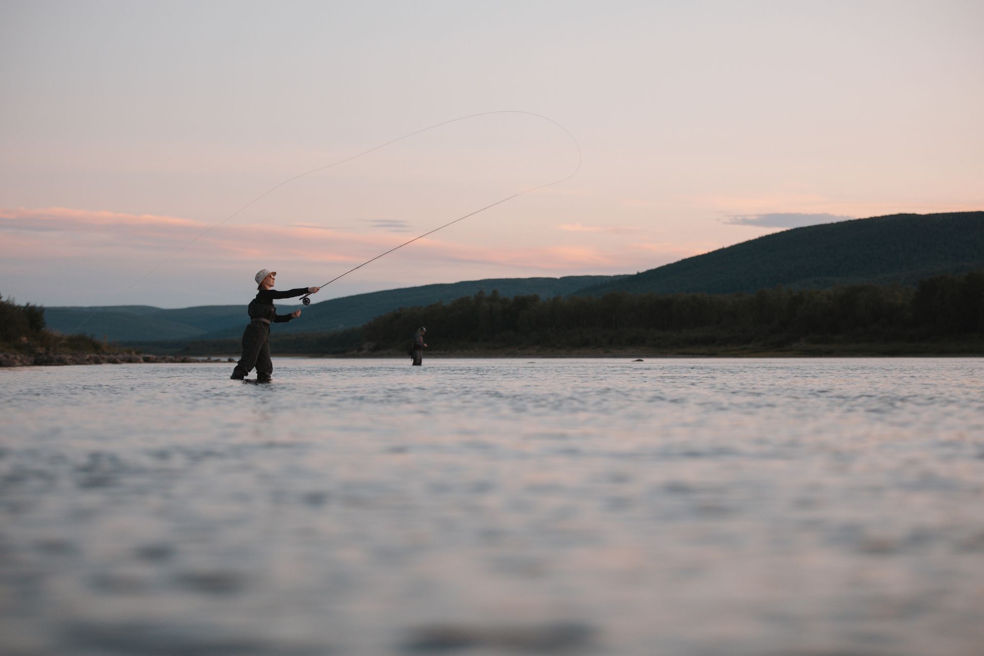 Teno fly fishing for grayling, image Samu Hurskainen.