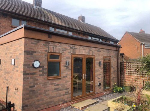 two door entryway of stone house