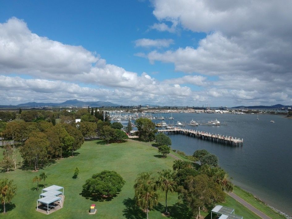 An Aerial View of a Park Next to a Body of Water — Specialist Support Solutions in Gladstone, QLD