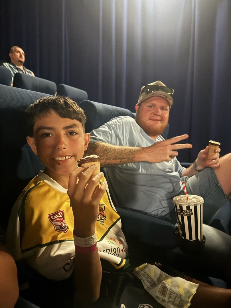 Two Men Are Making A Heart Shape With Hands — Specialist Support Solutions in Rockhampton City, QLD