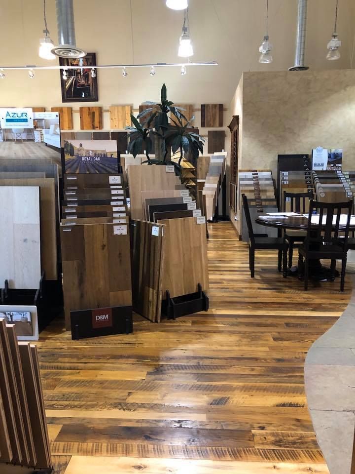 A store filled with lots of wooden floors and chairs