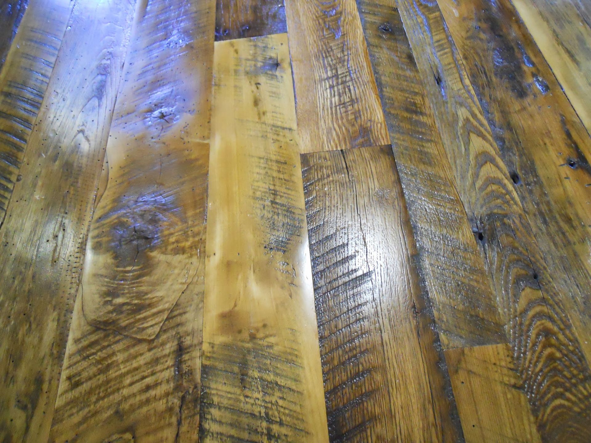 A close up of a wooden floor with a lot of grain