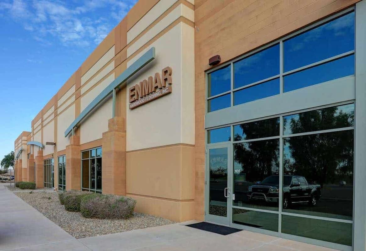 A large building with a sign that says ' emmar ' on it