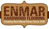 The logo for Enmar Hardwood Flooring creates real wood floors since 1975.