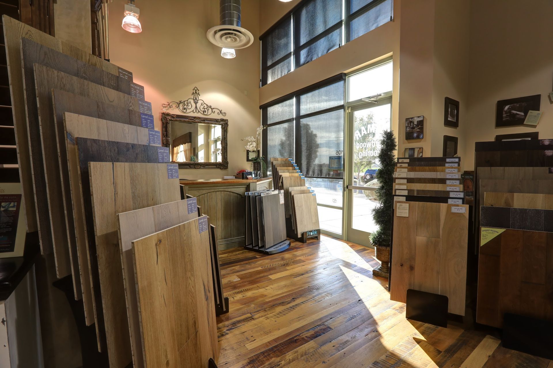 A room filled with lots of different types of wooden flooring.