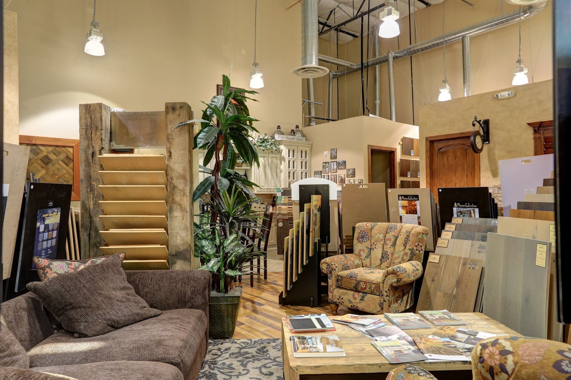 A living room with a couch and chairs in it
