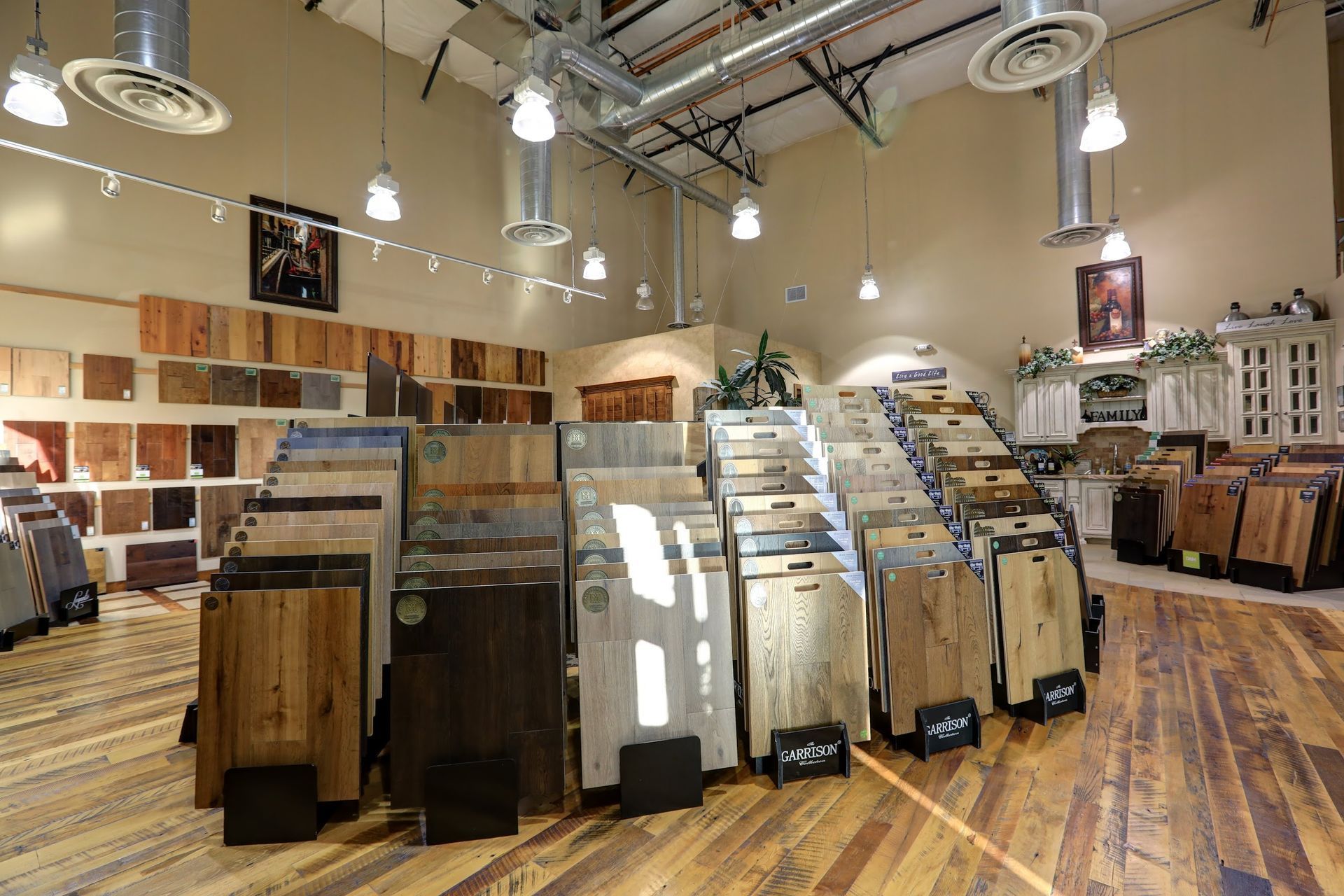 A large room filled with lots of different types of wooden flooring.
