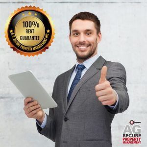 Man in suit holding tablet gives thumbs up, with 