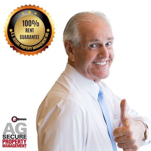 Smiling man giving a thumbs-up next to a 
