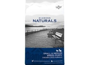 Bag of Diamond Naturals small & medium breed puppy food, with a scenic black and white background.