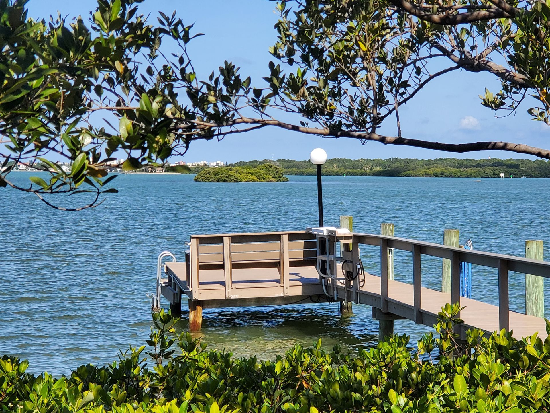 A wooden dock overlooking a body of water.