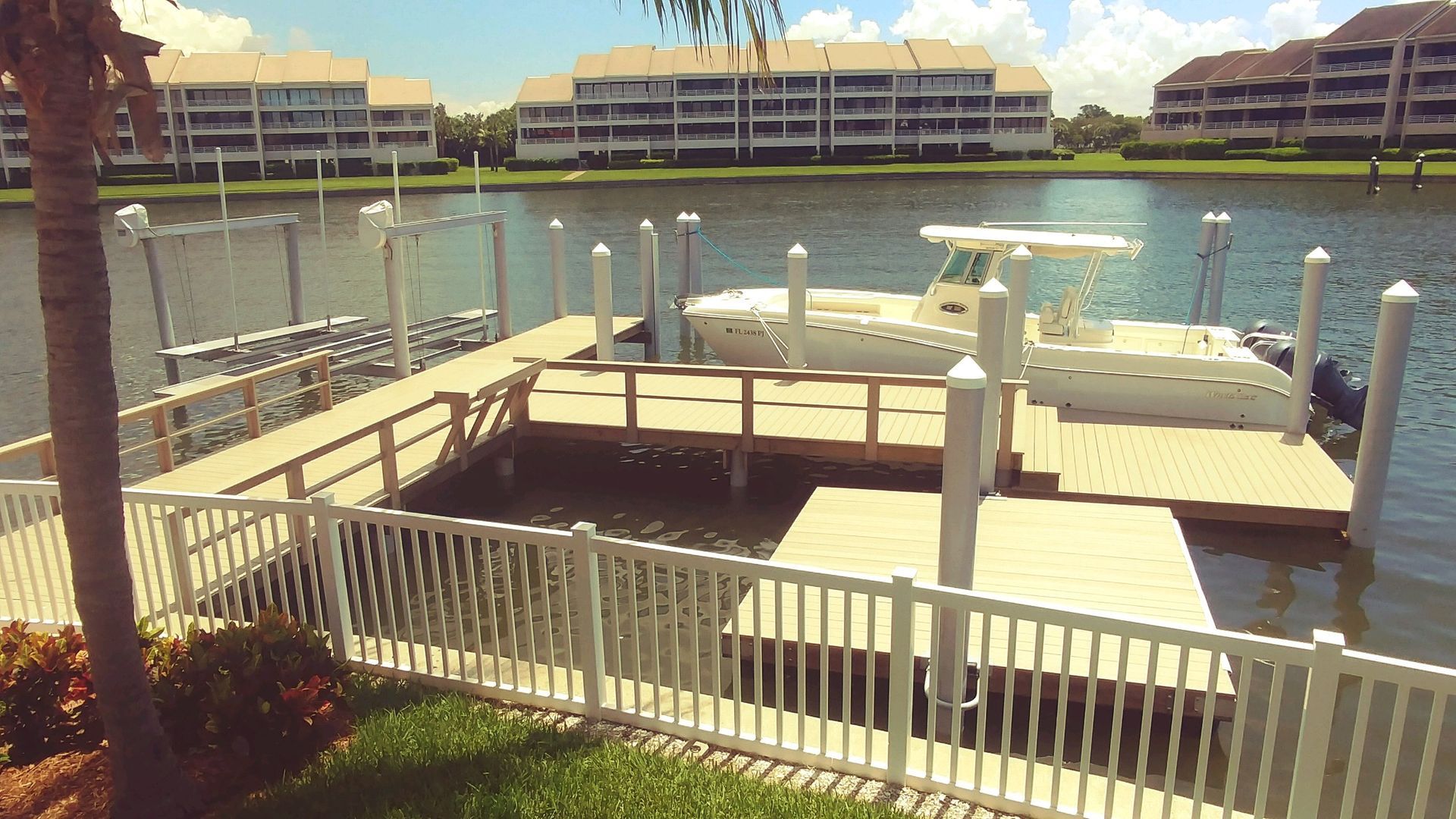 A boat is docked at a dock in the water.