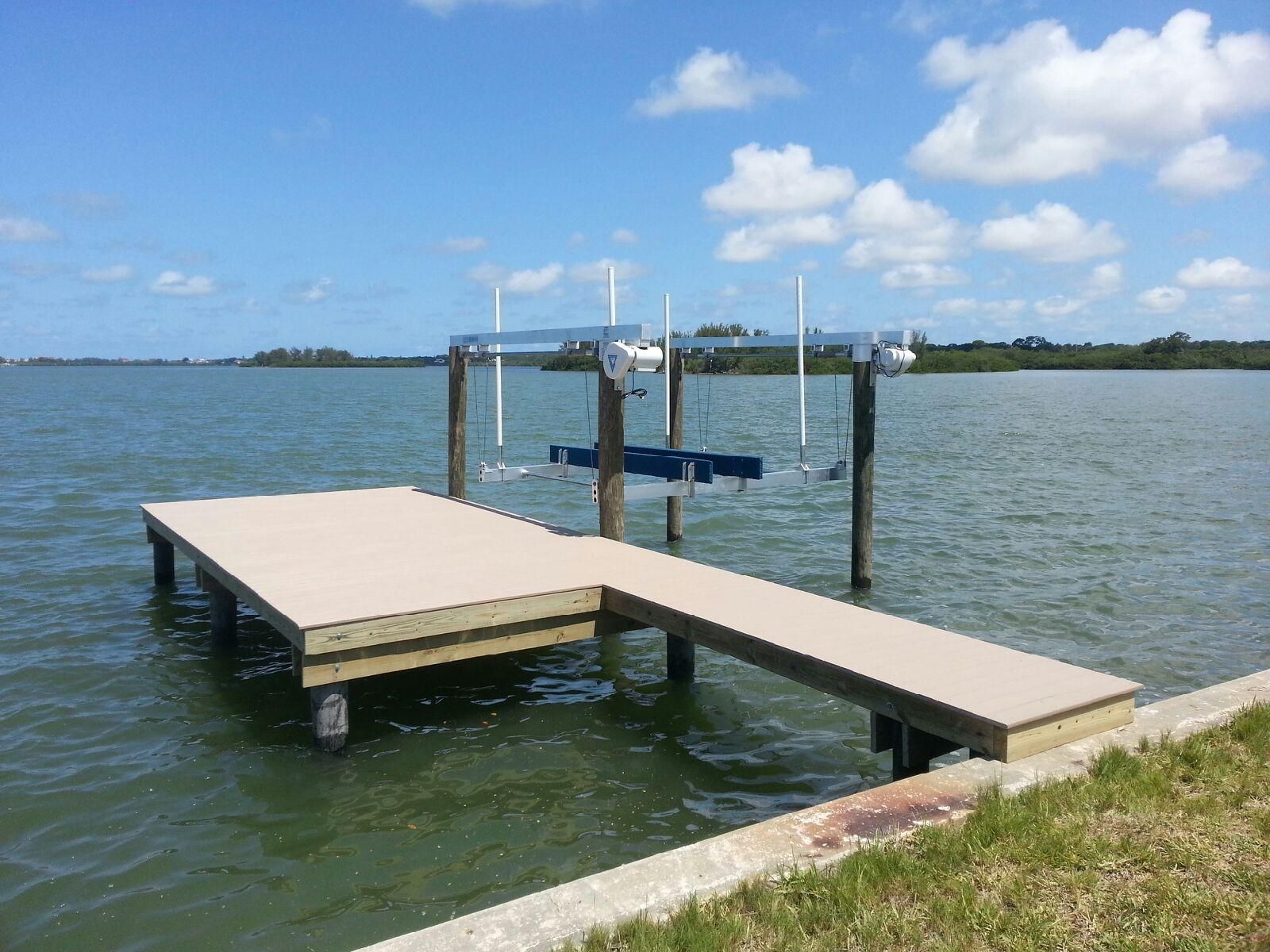 A dock in the middle of a large body of water.