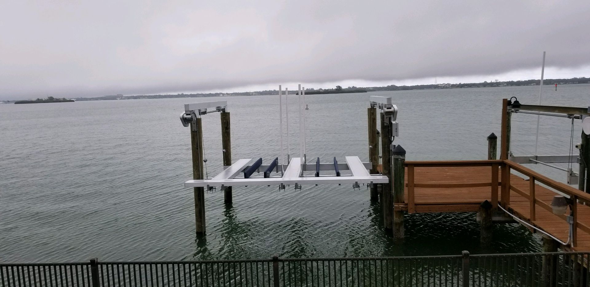 A dock in the middle of a body of water
