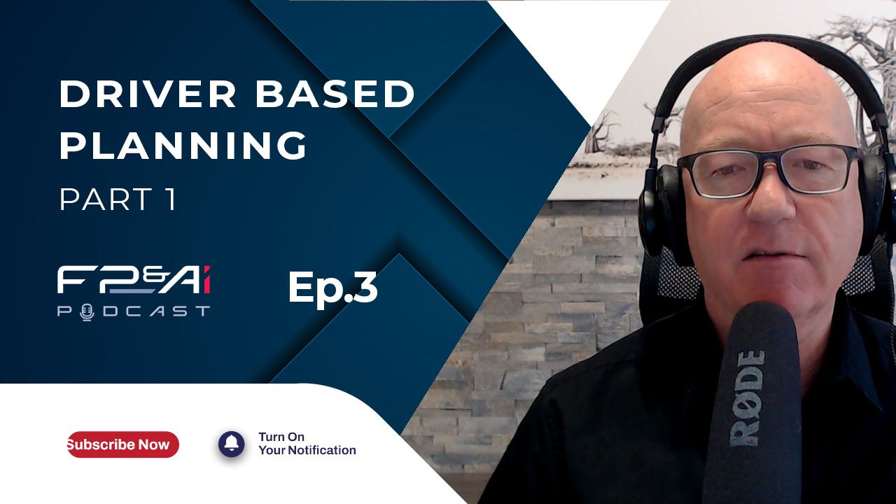 Man with glasses and headset speaks into microphone. Title: 