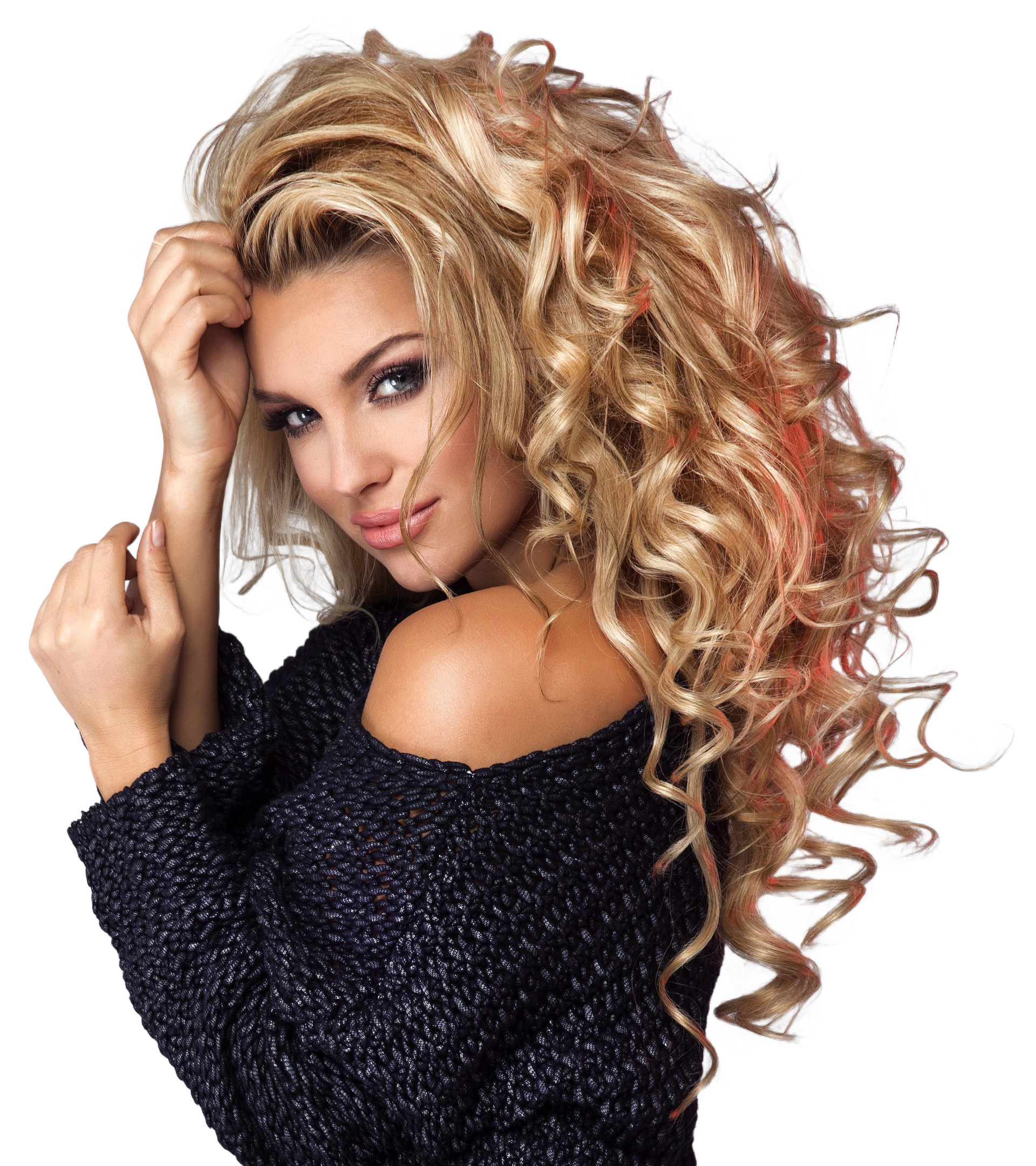 a woman with long curly hair is wearing a black sweater