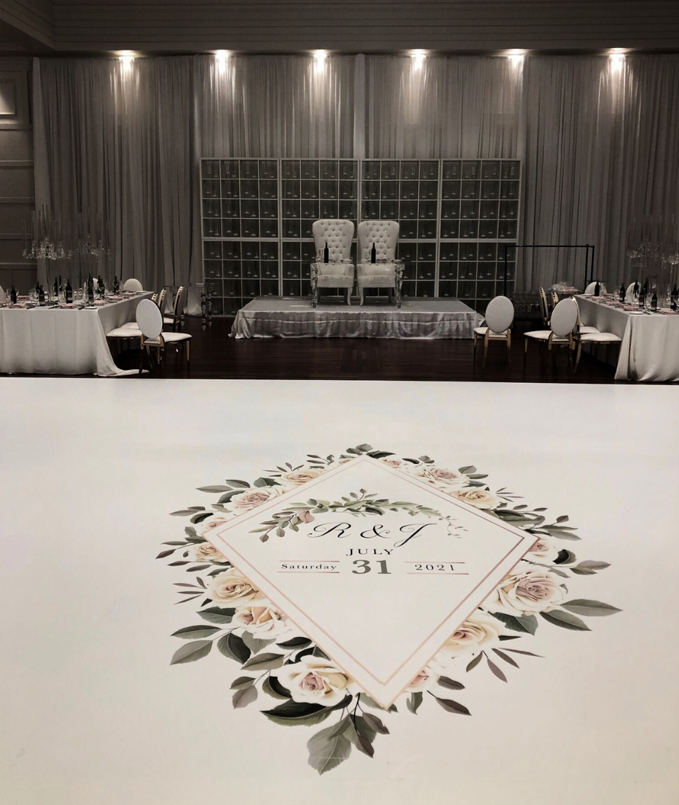 There is a dance floor with a floral design on it.
