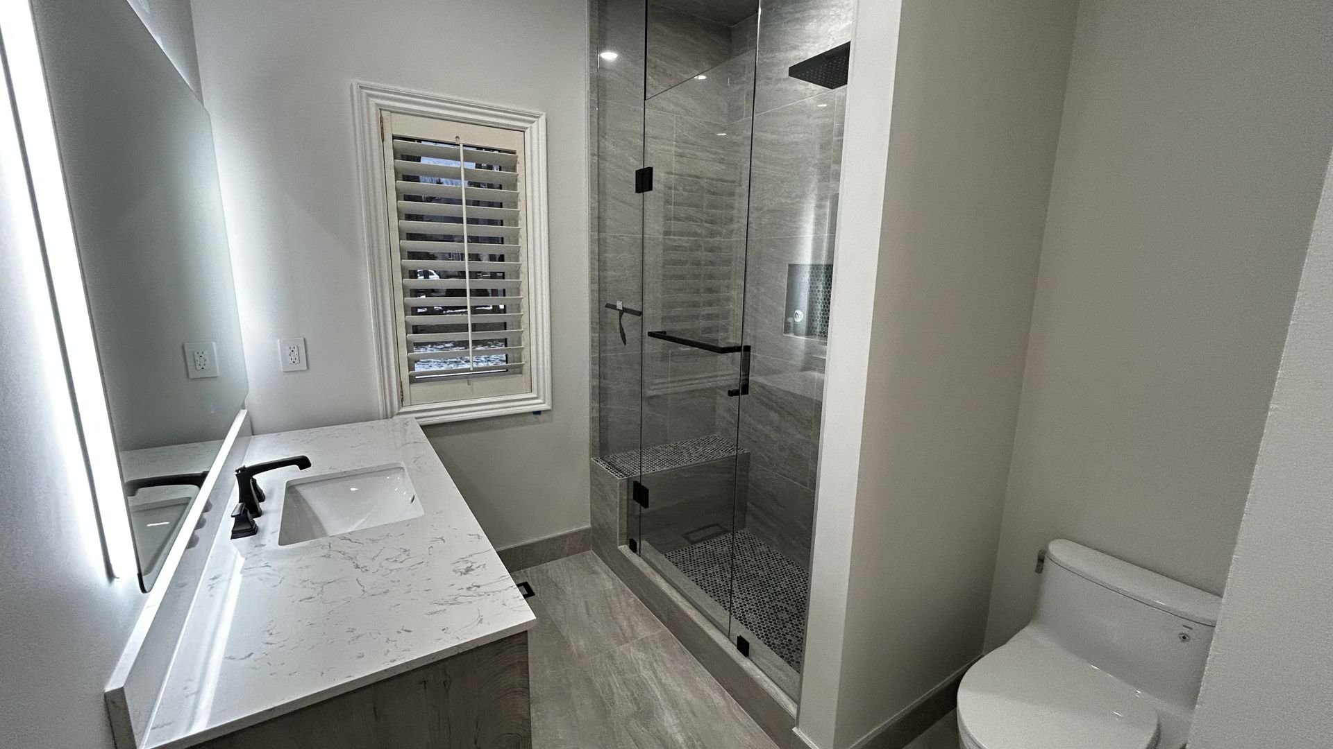 a well-furnished bathroom with modern fixtures