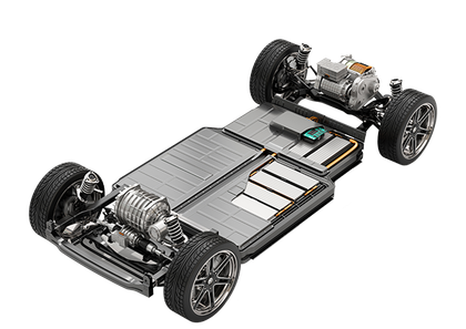 The underside of an electric car with a battery and motor.