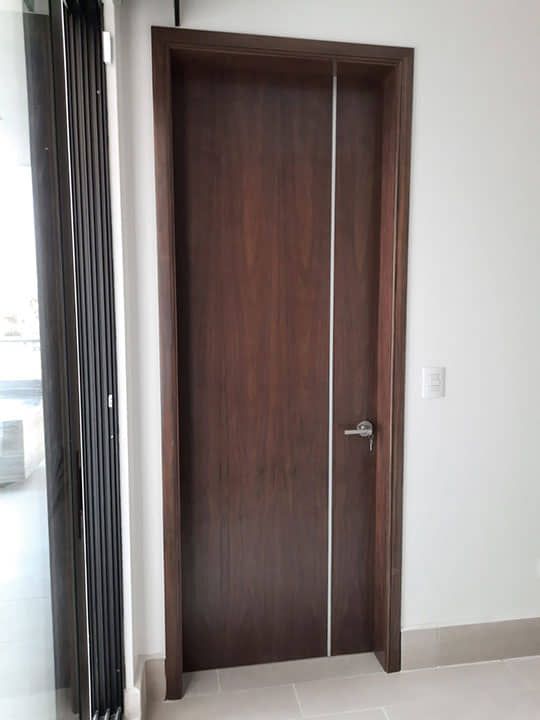 DISEÑO Y PROYECCIÓN - Puertas de nogal, puertas de comunicacion, interior doors, walnut interior doors with steel strip