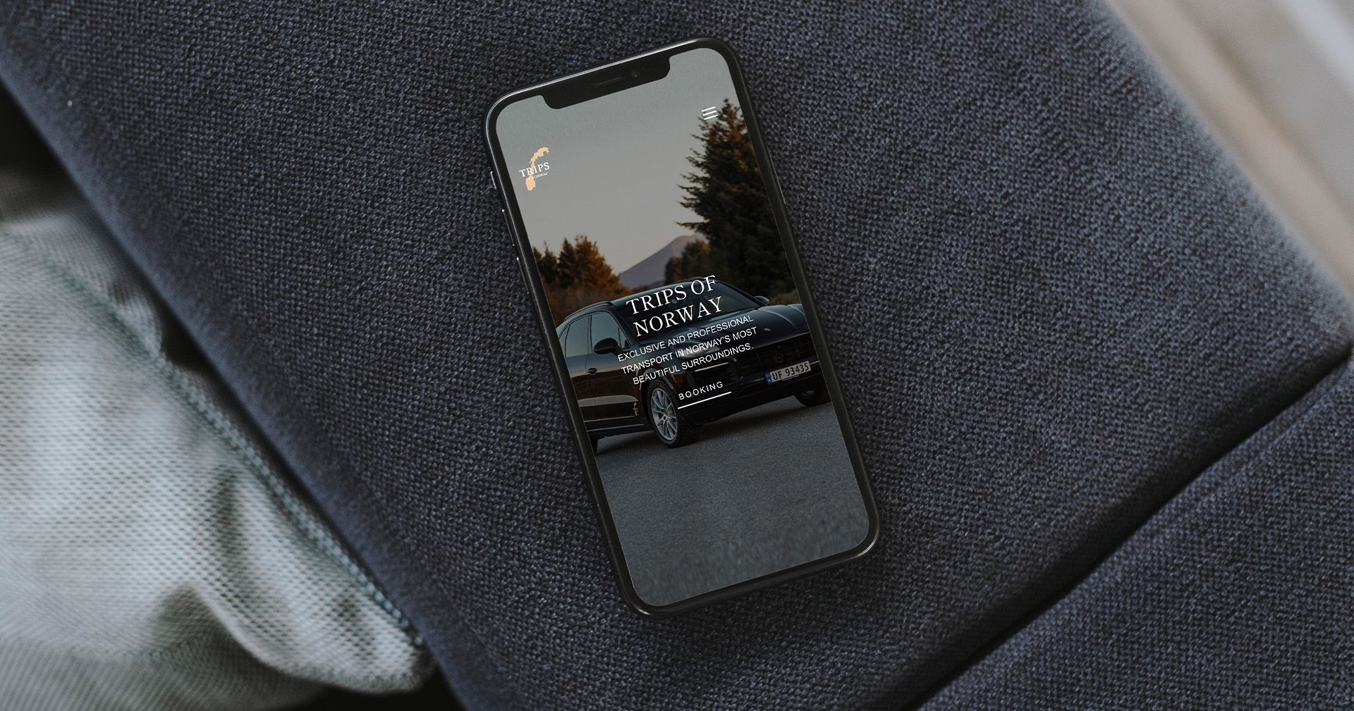 Iphone på kanten av en sofa 