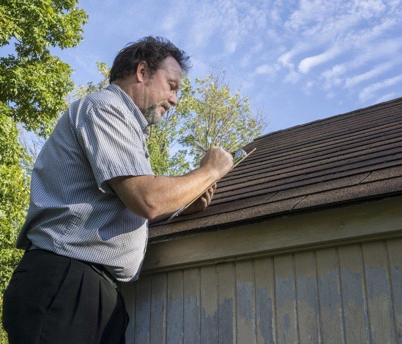 Roof repair estimates in Olean, Hornell, and Wellsville, NY