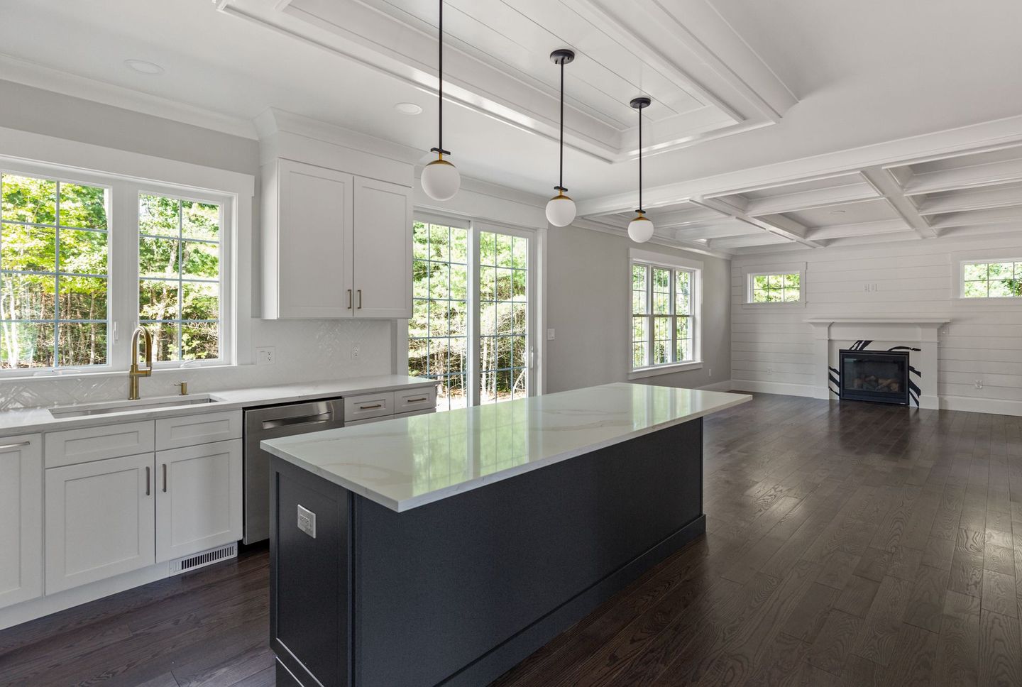 There is a large island in the middle of the kitchen.