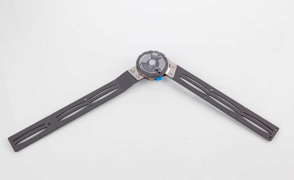 A close up of a knee brace on a white surface.