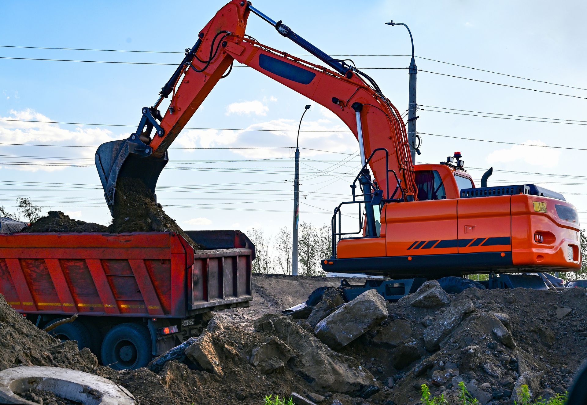 Excavator Moving Soil In Loading Truck - Gordon, NSW - Michan Australia Holdings Pty Ltd