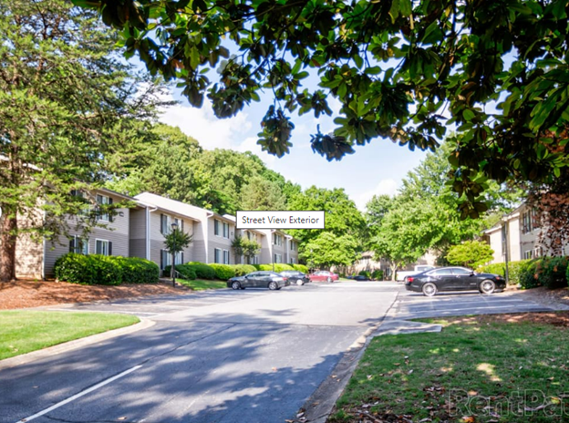 A street view of a residential area with a sign that says street view exterior