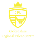 Yellow logo for Oxfordshire Regional Talent Centre, featuring a shield with "JPL" and a bull symbol, topped with a crown.