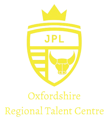 Yellow logo for Oxfordshire Regional Talent Centre, featuring a shield with "JPL" and a bull symbol, topped with a crown.