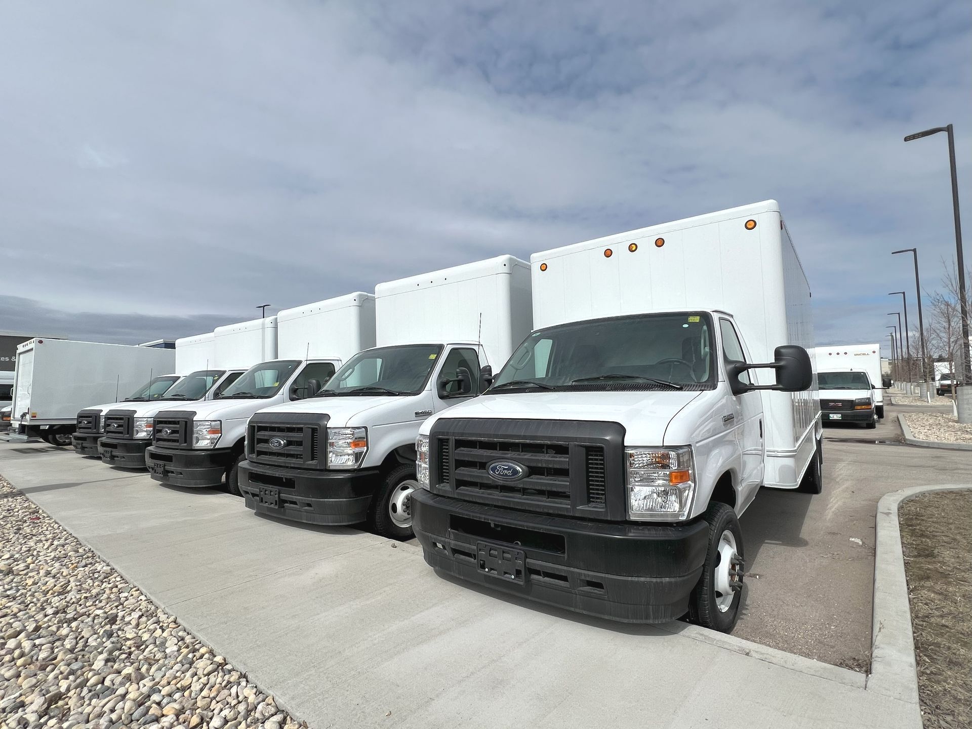 Row of Ford 1 Ton Cube Vans