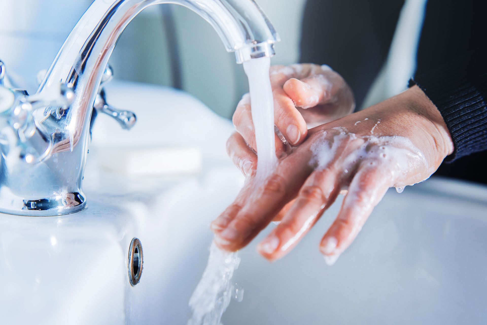 Woman Washing Hands — Elizabethtown, KY — A A Portable Sanitation