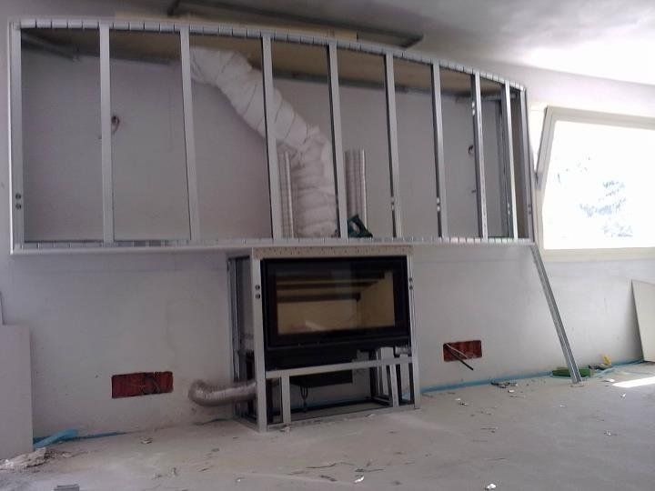 opera di rivestimento camino