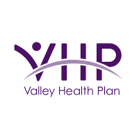 The logo for the valley health plan is purple and white.