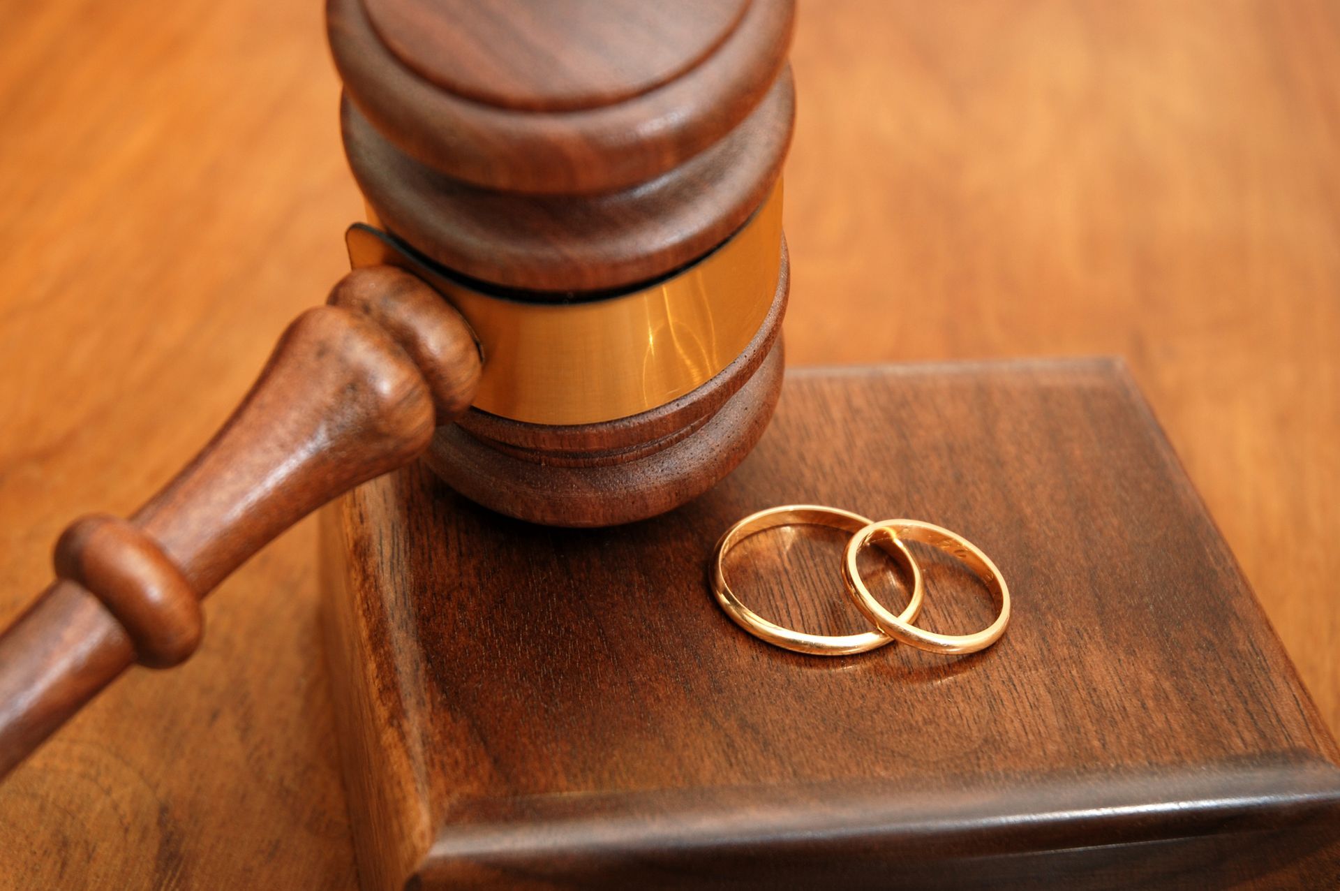 Judge's hammer and wedding rings