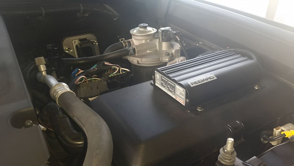 A Close Up Of A Car Engine With A Box On Top Of It — Mudgeeraba Auto Electrical & Mechanical In Mudgeeraba, QLD