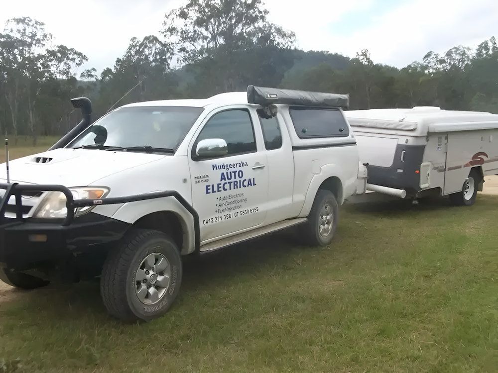 A White Truck With The Word Mito Electrical On The Side— Mudgeeraba Auto Electrical & Mechanical In Mudgeeraba, QLD