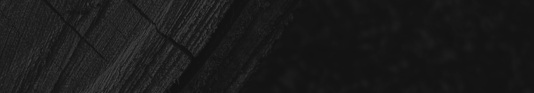 Tire tracks on black background | Autohaus Service & Sales