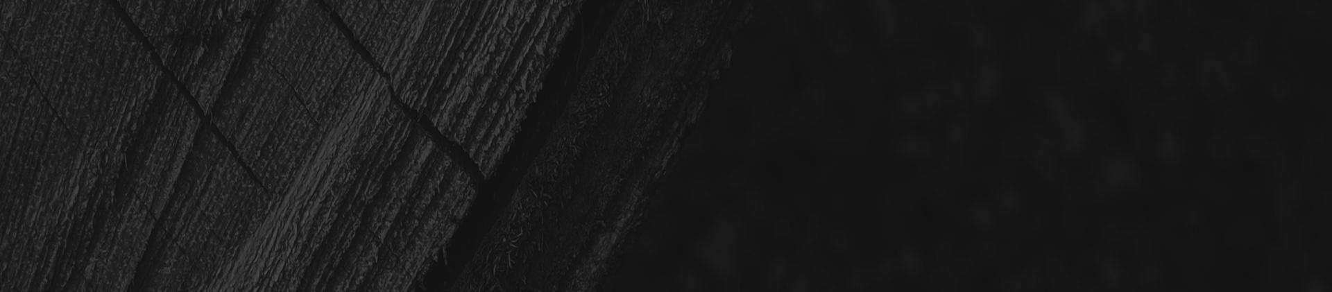 Tire tracks on black background | Autohaus Service & Sales