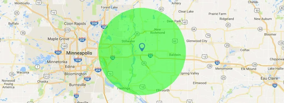 A map of a city with a green circle around it.
