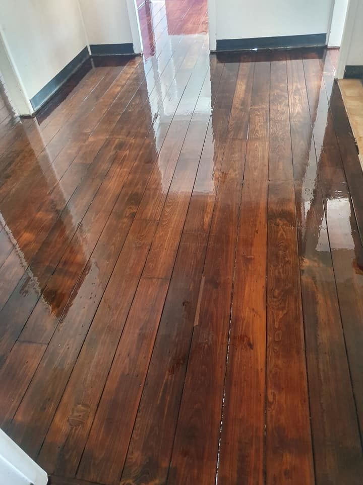 A Close up Of a Wooden Floor in A Room — Finish It Floor Sanding in Bucca, QLD