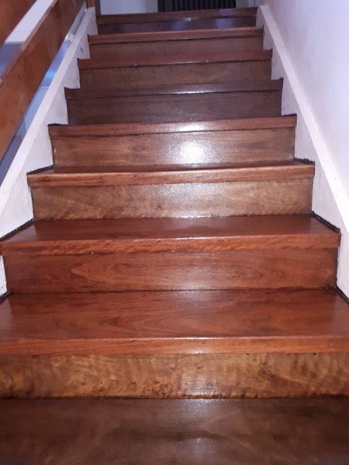 A Set of Wooden Stairs Leading up To a White Wall — Finish It Floor Sanding in Bucca, QLD