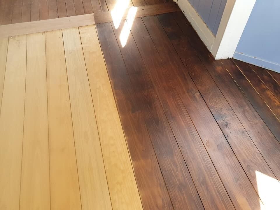 A Wooden Floor with Two Different Shades of Wood — Finish It Floor Sanding in Bucca, QLD
