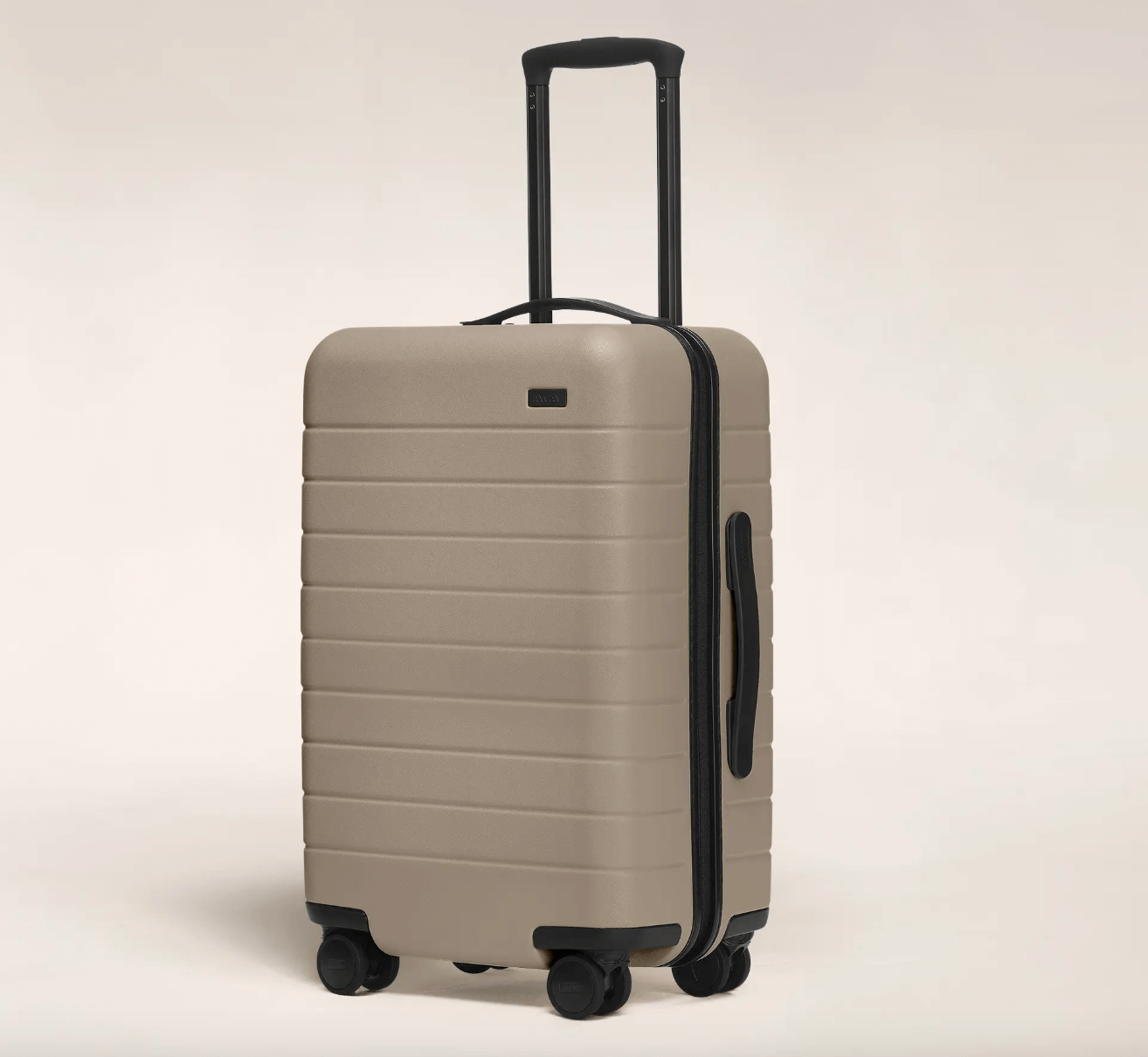 away carry on luggage sand color black zipper black handle black wheels hardside suitcase