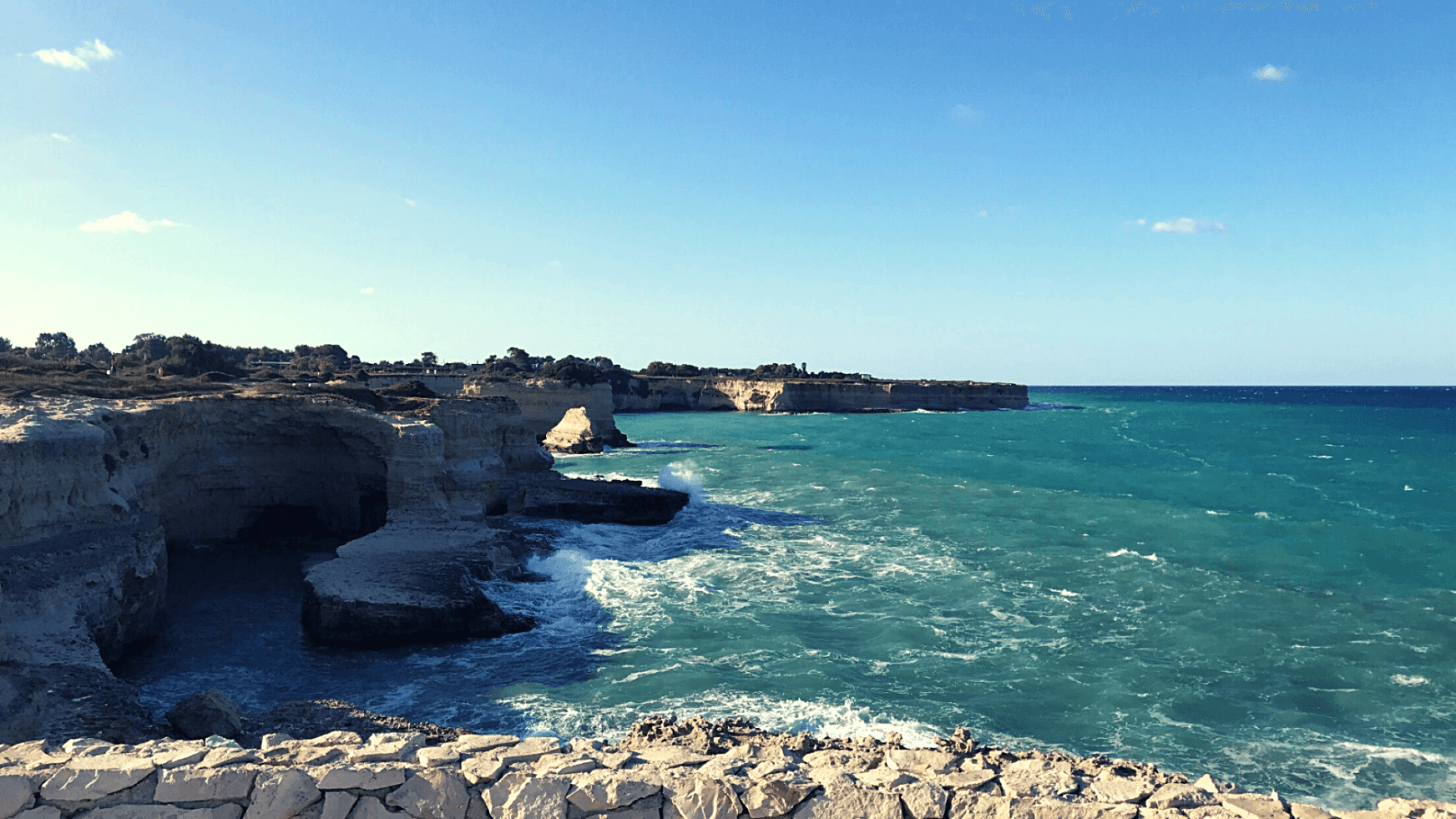 Torre Sant Andrea Puglia Italy rocky cliffs turquoise sea waves