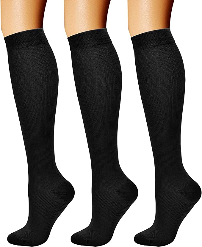 black compression socks on three legs