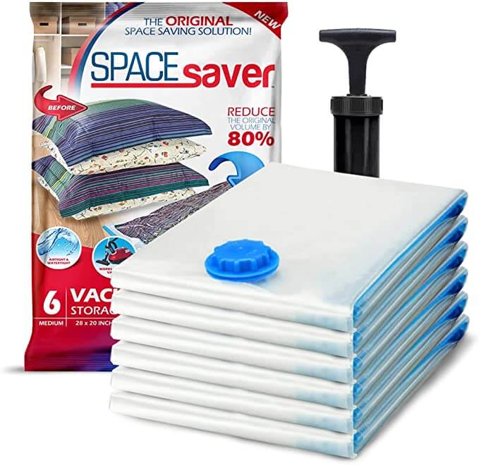 space saver vacuum bags white bags stacked with blue valve and blue trim black travel pump