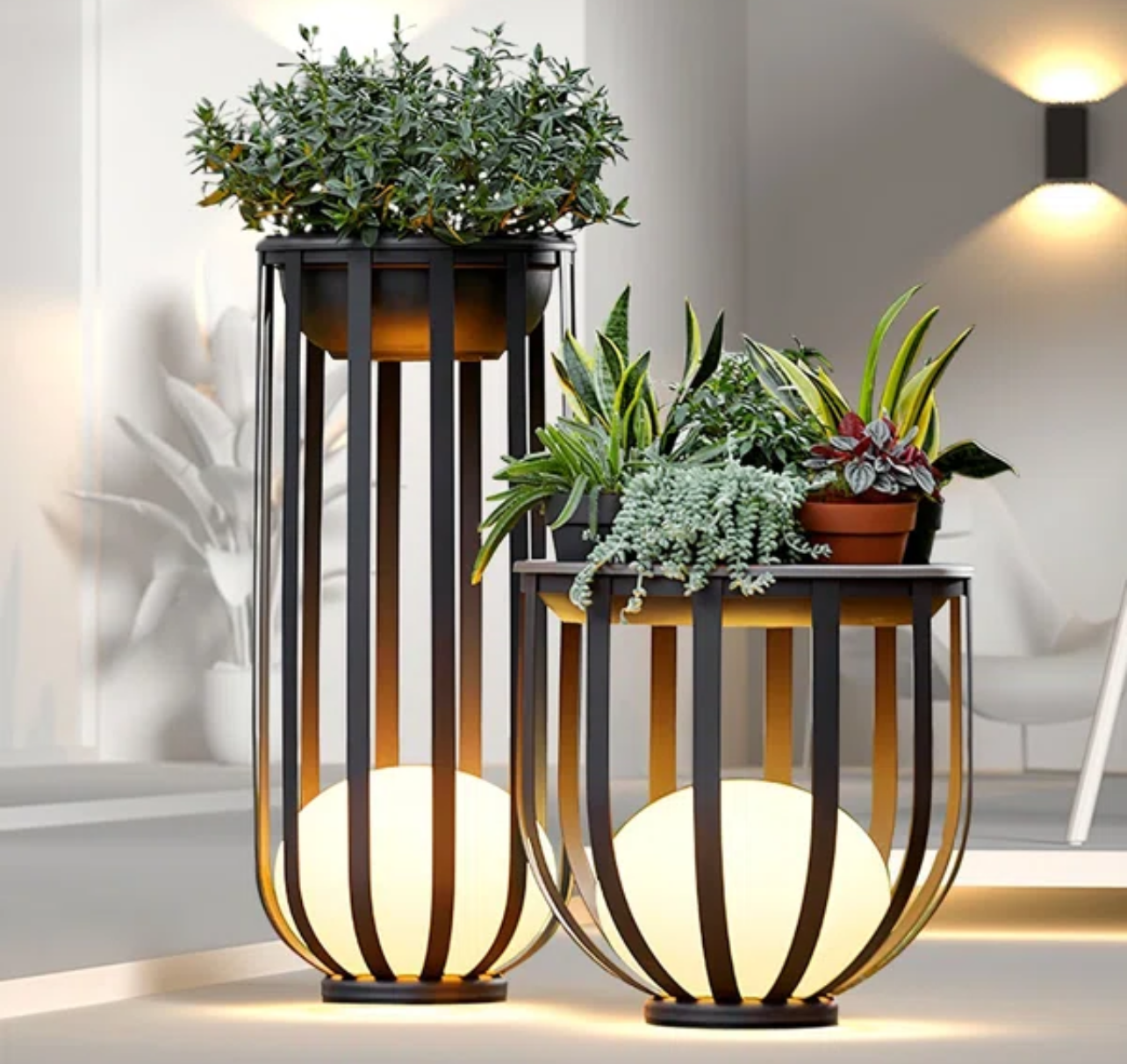 A lush garden with various green and blue plants, large rocks, and a brick wall in the background. A small dog rests near a rock.